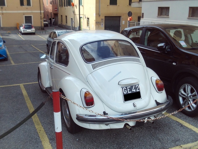 www.targhenere.net/gallery2/wp-content/uploads/2023/10/vw_maggiolino_ott23_retro_blowup_tn46240.jpg
