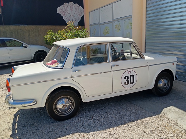 www.targhenere.net/gallery2/wp-content/uploads/2026/07/fiat_1100_d_lug26_blowup_tn41656.jpg