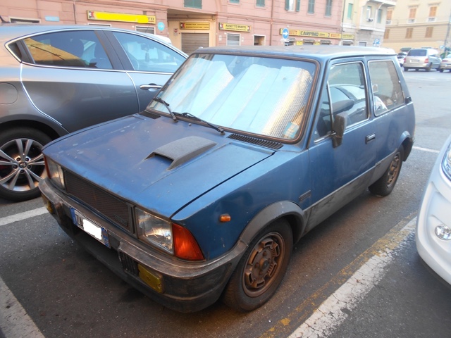 www.targhenere.net/images/003/innocenti_mini_de_tomaso_set_16_front_zpstpwqsmch.jpg