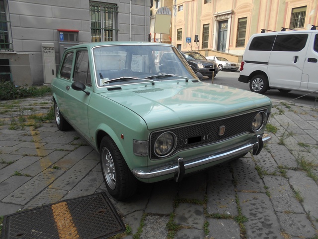 www.targhenere.net/images/006/fiat_128_lug17_front_blowup_tn23079_zpsqa5oeh40.jpg